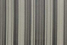 Load image into Gallery viewer, This jacquard fabric features variegated stripes in graphite and black.  It is perfect for accent pillows, window treatments (draperies and valances), and upholstery projects.  We offer this fabric in other colors.
