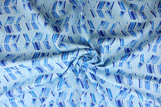  Spring In To Action is an ideal choice for any multipurpose piece.  Its abstract arrows and shades of blue pattern creates a stunning visual, while its 51,000 double rubs ensures its durability and resilience.  Perfect for window accents (draperies, valances, curtains and swags) cornice boards, accent pillows, bedding, headboards, cushions, ottomans, slipcovers and light duty upholstery.  