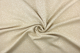 This fabric features a textured, leaf scroll pattern in ivory and light beige.  It has a slight sheen and offers beautiful design, style and color to any space in your home.  It has a soft workable feel and is perfect for window treatments (draperies, valances, curtains, and swags), bed skirts, duvet covers, pillow shams and accent pillows.  