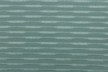 Load image into Gallery viewer, This duotone striped jacquard fabric in dark seafoam green is durable and hard wearing with a rating of 30,000 double rubs.  It can be used for multi purpose upholstery, bedding, accent pillows and drapery.  
