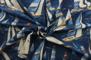 In the Breeze, a 100% cotton duck fabric featuring cheerful designs of sail boats and light houses. With 15,000 double rubs of strength and colorfastness, this luxurious indigo, brown, light blue, red, and tan material will last and look great for years to come. The versatile fabric is perfect for window accents (draperies, valances, curtains and swags) cornice boards, accent pillows, bedding, headboards, cushions, ottomans, slipcovers and light duty upholstery.  