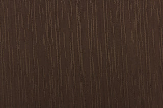 Session is a textured duo tone fabric in brown.  It is clean and crisp and would work well for draperies, curtains, cornice boards, pillows, cushions, bedding, headboards and other craft projects.