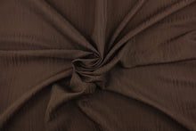 Load image into Gallery viewer, Session is a textured duo tone fabric in brown.  It is clean and crisp and would work well for draperies, curtains, cornice boards, pillows, cushions, bedding, headboards and other craft projects.
