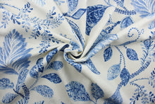 Load image into Gallery viewer, Artemis offers a charming mix of floral and leaf designs in shades of blue and white. This soil and stain repellant fabric is perfect for upholstery that needs to hold up in busy environments. The versatile fabric is perfect for window accents (draperies, valances, curtains and swags) cornice boards, accent pillows, bedding, headboards, cushions, ottomans, slipcovers and upholstery.  
