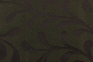 Havelock features a leaf scroll design in dark brown and deep green.  A slight sheen enhances the design.  This fabric offers beautiful design, style and color to any space in your home.  It has a soft workable feel and is perfect for window treatments (draperies, valances, curtains, and swags), bed skirts, duvet covers, pillow shams and accent pillows.  