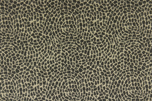 This fabric features a circular pattern in onyx and gold.  It offers beautiful design, style and color to any space in your home.  It has a soft workable feel and is perfect for window treatments (draperies, valances, curtains, and swags), bed skirts, duvet covers, pillow shams and accent pillows.  