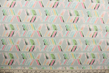 Load image into Gallery viewer, Spring In To Action features abstract arrows in colorful shades of pink, blue, green, white and yellow against a gray background. Its 51,000 double rubs ensures its durability and resilience.  Perfect for window accents (draperies, valances, curtains and swags) cornice boards, accent pillows, bedding, headboards, cushions, ottomans, slipcovers and light duty upholstery.  
