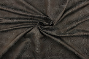 Makine features a wave design in dark brown and mineral blue. It offers beautiful design, style and color to any space in your home.  It has a soft workable feel and is perfect for window treatments (draperies, valances, curtains, and swags), bed skirts, duvet covers, pillow shams and accent pillows.  