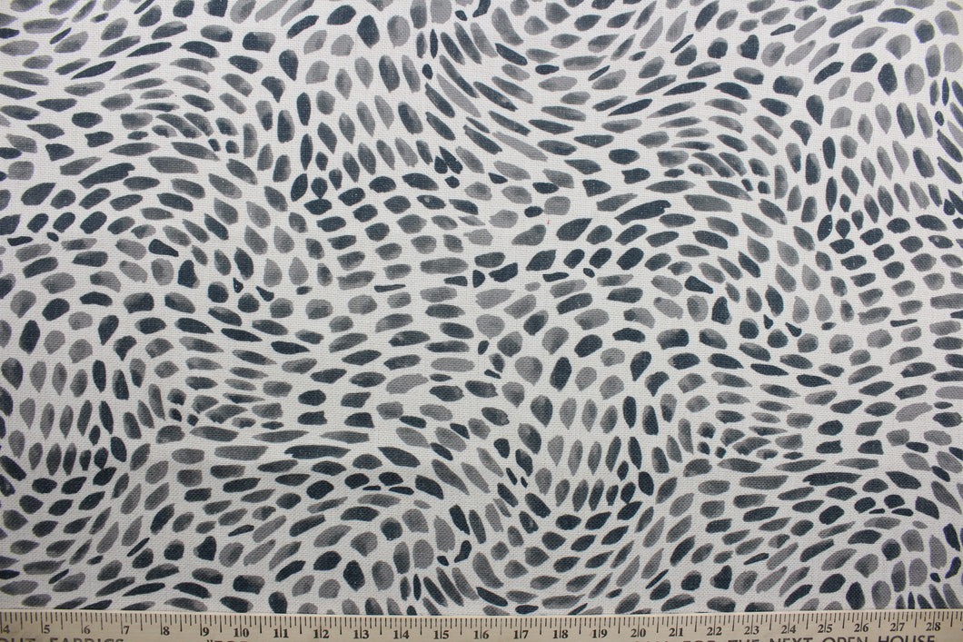  Everly in Dalmatian is a polyester fabric featuring a black and white abstract design. Incredibly versatile, it can be used for window accents, cornice boards, accent pillows, bedding, headboards and upholstery. It offers a contemporary look perfect for any environment.