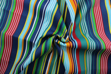 Load image into Gallery viewer, Labrisa is the perfect outdoor fabric for your creative projects.  The fabric is adorned with multi-width stripes in shades of blue, red, white, green, yellow, orange, and teal.  It&#39;s specially designed to resist fading to 500 hours of direct sunlight.  Additionally, it is both water and stain resistant, and has a durable 10,000 double rubs construction.  Perfect for porches, patios and pool side.  Uses include toss pillows, cushions, upholstery, tote bags and more.  
