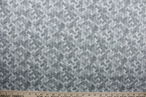 Mixes in is a stylish, outdoor fabric with a modern basket weave pattern. This durable fabric is constructed in shades of grey, creating an elegant look that's perfect for your outdoor furniture.  It is UV fade, water and stain resistant, with a durability rating of 15,000 double rubs. Perfect for any outdoor space.  Perfect for porches, patios and pool side.  Uses include toss pillows, cushions, upholstery, tote bags and more.  