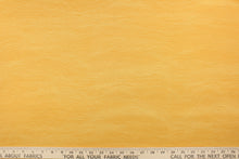 Load image into Gallery viewer, This screen printed fabric features a striae design in orange and yellow.  It can be used for several different statement projects including window accents (drapery, curtains and swags), toss pillows, bed skirts, light duty upholstery, handbags and duvet covers. It has a soft workable feel yet is stable and durable.  

