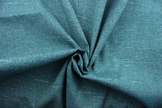Tory is perfect for outdoor use, constructed from a durable oasis (deep teal) fabric with white accents that can withstand up to 500 hours of direct sunlight.  It is both stain and water resistant and offers 10,000 double rubs for long-lasting performance.  Perfect for porches, patios and pool side.  Uses include toss pillows, cushions, upholstery, tote bags and more.  