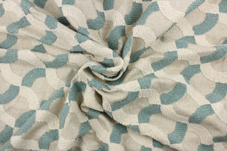 This fabric features an embossed lattice design in seafoam green and beige on an oatmeal colored background.  Use this for light upholstery, pillows, bedding and window treatments.  We offer Nash in other colors.