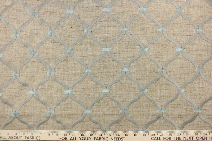 This embroidered fabric features a lattice design in wheat, gray and mint green.  It offers beautiful design, style and color to any space in your home.  It has a soft workable feel and is perfect for window treatments (draperies, valances, curtains, and swags), upholstery, bed skirts and accent pillows.  