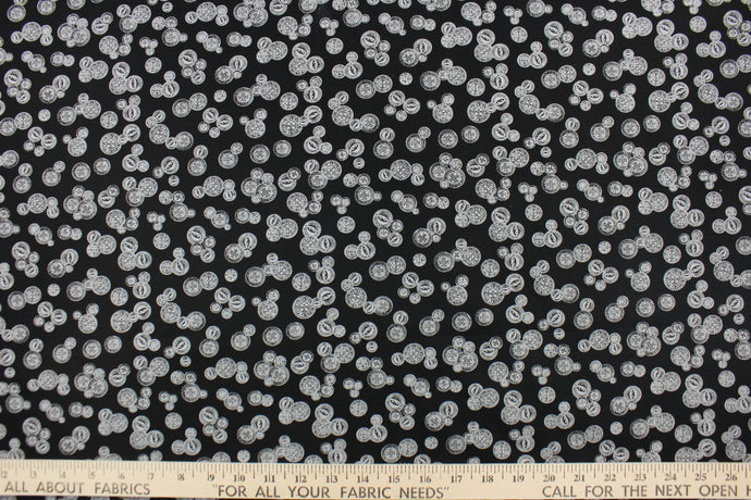 This elegant quilting print features vintage buttons in gray with outline/shading in different sizes set against a black background.  It can be used in all quilting designs, crafts, home décor.  Add a bit of vintage and uniqueness to any design. We offer this pattern in a few different colors. 