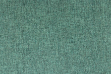 Load image into Gallery viewer, This fabric in seaglass (blue/green) offers beautiful design, style and color to any space in your home.  It has a soft workable feel and is perfect for window treatments (draperies, valances, curtains, and swags), bed skirts, duvet covers, light upholstery, pillow shams and accent pillows.  We offer Ratio in other colors.

