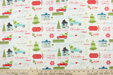 Load image into Gallery viewer, Embrace the Holiday season with Cherry Guidry&#39;s Heart &amp; Home Collection.  This cheerful print features jolly seasonal sayings along with a bustling winter village.  The versatile lightweight fabric is soft and easy to sew.  It would be great for quilting, crafting and sewing projects.  Colors include white, blue, green, red and black.  We offer this print in one other color.
