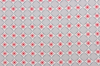 This is a cute and simple print of diamonds and snowflakes.  The versatile lightweight fabric is soft and easy to sew.  It would be great for quilting, crafting and sewing projects.  Colors include red, grey and white.