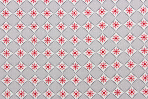 This is a cute and simple print of diamonds and snowflakes.  The versatile lightweight fabric is soft and easy to sew.  It would be great for quilting, crafting and sewing projects.  Colors include red, grey and white.