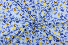 Load image into Gallery viewer, Feel the warmth of a sunny, summer day with these beautiful butterflies. This versatile lightweight fabric is soft and easy to sew.  It would be great for quilting, crafting and sewing projects.  Colors include shades of blue, yellow, brown and black.

