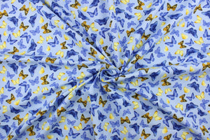 Feel the warmth of a sunny, summer day with these beautiful butterflies. This versatile lightweight fabric is soft and easy to sew.  It would be great for quilting, crafting and sewing projects.  Colors include shades of blue, yellow, brown and black.