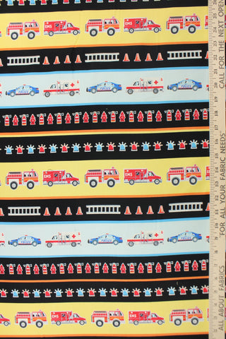 Add a pop of color with this fabric that features brightly colored first responder vehicles that glow in the dark.  Each classic design has fine detail and the natural colors are touched with metallic gold.  This versatile lightweight fabric is soft and easy to sew.  It would be great for quilting, crafting and sewing projects.  Colors included are red, orange, blue, yellow, white and black.