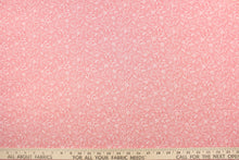 Load image into Gallery viewer, This fabric features tiny wispy flowers in white on a coral background. The versatile lightweight fabric is soft and easy to sew.  It would be great for quilting, crafting and sewing projects.  
