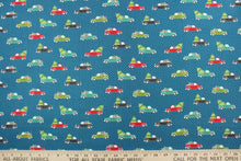 Load image into Gallery viewer, Embrace the Holiday season with Cherry Guidry&#39;s Heart &amp; Home Collection.  This cheerful print features trucks carrying gifts and trees.  The versatile lightweight fabric is soft and easy to sew.  It would be great for quilting, crafting and sewing projects.  Colors include blue, red, black, white and shades of green.
