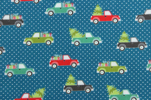 Embrace the Holiday season with Cherry Guidry's Heart & Home Collection.  This cheerful print features trucks carrying gifts and trees.  The versatile lightweight fabric is soft and easy to sew.  It would be great for quilting, crafting and sewing projects.  Colors include blue, red, black, white and shades of green.
