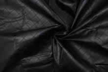 Load image into Gallery viewer, This vinyl fabric features a diamond design in black .

