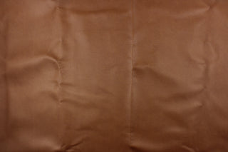 Richard Faux Leather Fabric in Caramel Brown