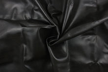 Load image into Gallery viewer, This vinyl fabric features a slight crackle design in black.
