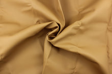Load image into Gallery viewer, This vinyl fabric features a smooth design in golden tan . 
