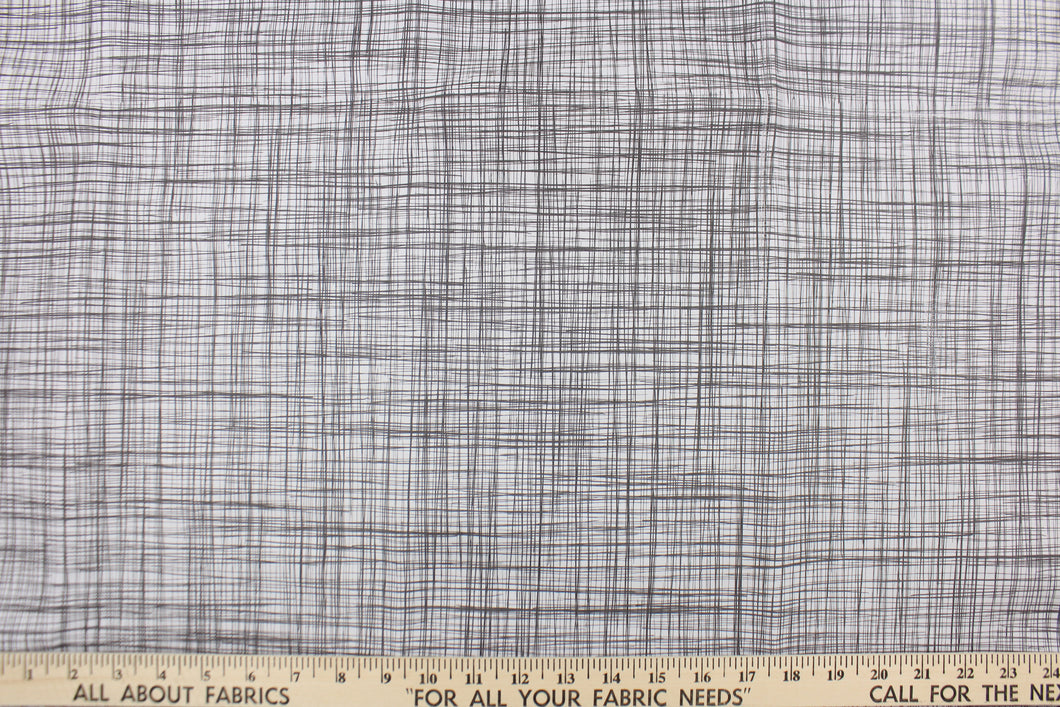 This vinyl fabric features a cross hatch design in gray set against a very pale gray. 