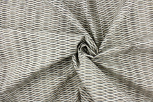 Load image into Gallery viewer, This fabric features a geometric design in dark gray, white, and light beige. 
