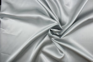 A beautiful satin fabric in a silver color. 