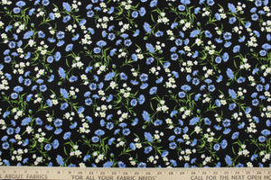  Feel the warmth of a sunny, summer day with these beautiful cornflowers and posies.  This versatile lightweight fabric is soft and easy to sew.  It would be great for quilting, crafting and sewing projects.  Colors include shades of blue, white, green and black.