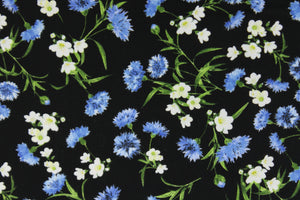  Feel the warmth of a sunny, summer day with these beautiful cornflowers and posies.  This versatile lightweight fabric is soft and easy to sew.  It would be great for quilting, crafting and sewing projects.  Colors include shades of blue, white, green and black.