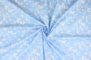 Think of a warm, sunny, summer day with this fabric featuring large and small butterflies in pink and white on a baby blue background.  The versatile lightweight fabric is soft and easy to sew.  It would be great for quilting, crafting and sewing projects.  