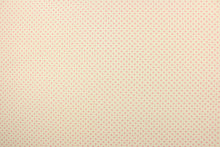 Load image into Gallery viewer, This fabric features pink polka dots on a cream background.  The versatile lightweight fabric is soft and easy to sew.  It would be great for quilting, crafting and sewing projects.  
