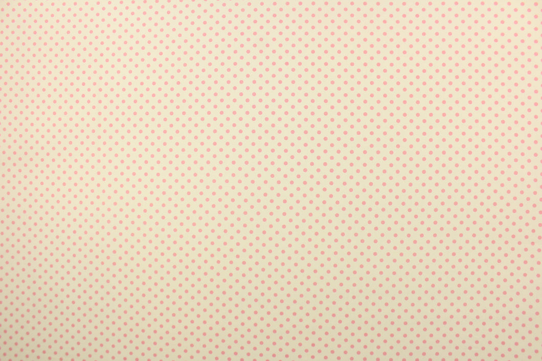This fabric features pink polka dots on a cream background.  The versatile lightweight fabric is soft and easy to sew.  It would be great for quilting, crafting and sewing projects.  