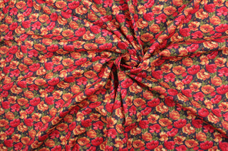  From the "Cats N Quilts" collection, Poppies in Bloom features large, vibrant poppy flowers in red and orange on a black background.  The versatile lightweight fabric is soft and easy to sew.  It would be great for quilting, crafting and sewing projects.  