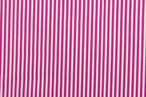 This fabric features stripes in fuchsia and white.  The versatile lightweight fabric is soft and easy to sew.  It would be great for quilting, crafting and sewing projects.  