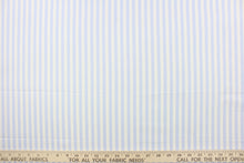 Load image into Gallery viewer, This fabric features stripes in baby blue and white.  The versatile lightweight fabric is soft and easy to sew.  It would be great for quilting, crafting and sewing projects.  
