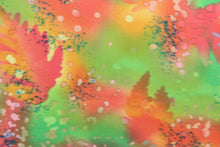 Load image into Gallery viewer, This fabric features ferns with a distressed look that enhances the design.  Colors included are green, pink, red and orange.  It has a nice soft hand and would be great for quilting, crafting and home decor.  We offer this fabric in several different colors.
