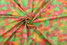 Load image into Gallery viewer, This fabric features ferns with a distressed look that enhances the design.  Colors included are green, pink, red and orange.  It has a nice soft hand and would be great for quilting, crafting and home decor.  We offer this fabric in several different colors.
