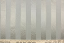 Load image into Gallery viewer, This fabric features a stripe design in gray with  a slight shine. 
