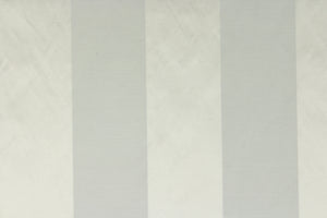 This fabric features a wide stripe design in pale gray with green undertones and a slight shine. 