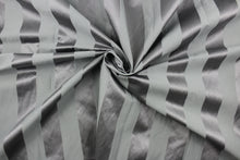 Load image into Gallery viewer, This fabric features a stripe design in gray with a slight shine. 
